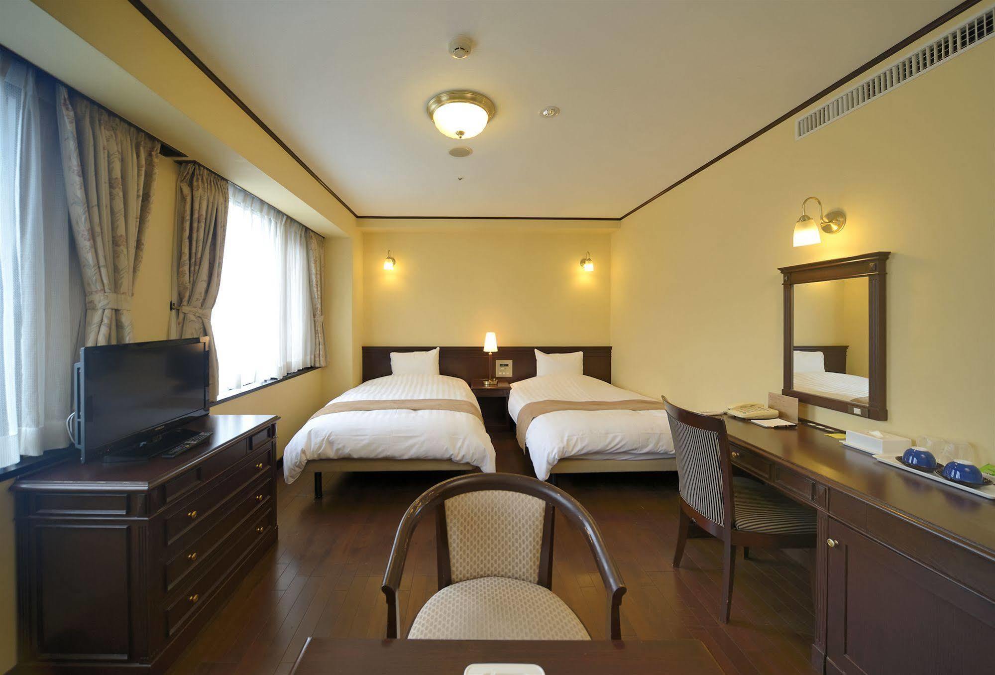 Amami Sunplaza Hotel Luaran gambar