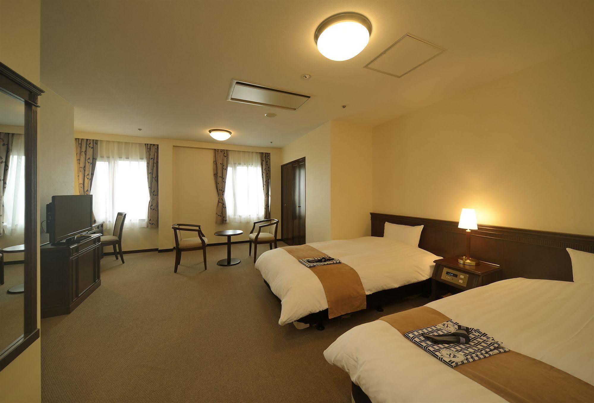 Amami Sunplaza Hotel Luaran gambar