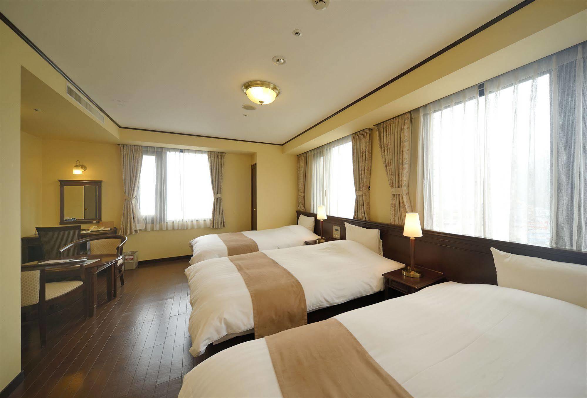 Amami Sunplaza Hotel Luaran gambar